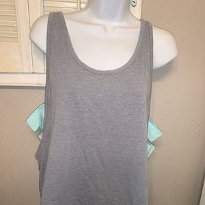 Under Armour workout Tank with cutout sides.